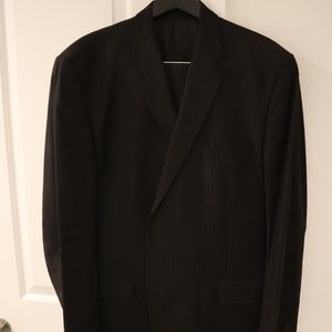 Men’s CK suit, 48L/40W, black w/gray stripe, two-button, like new.